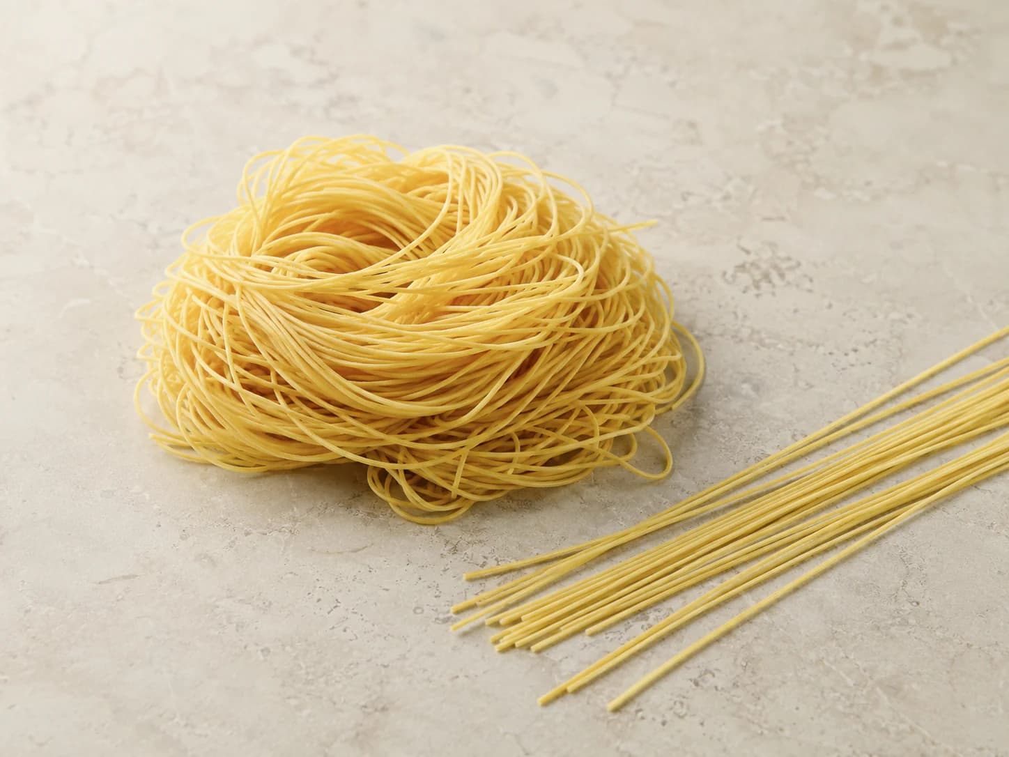 Fine wheat egg noodle strands for ingredient and allergen review