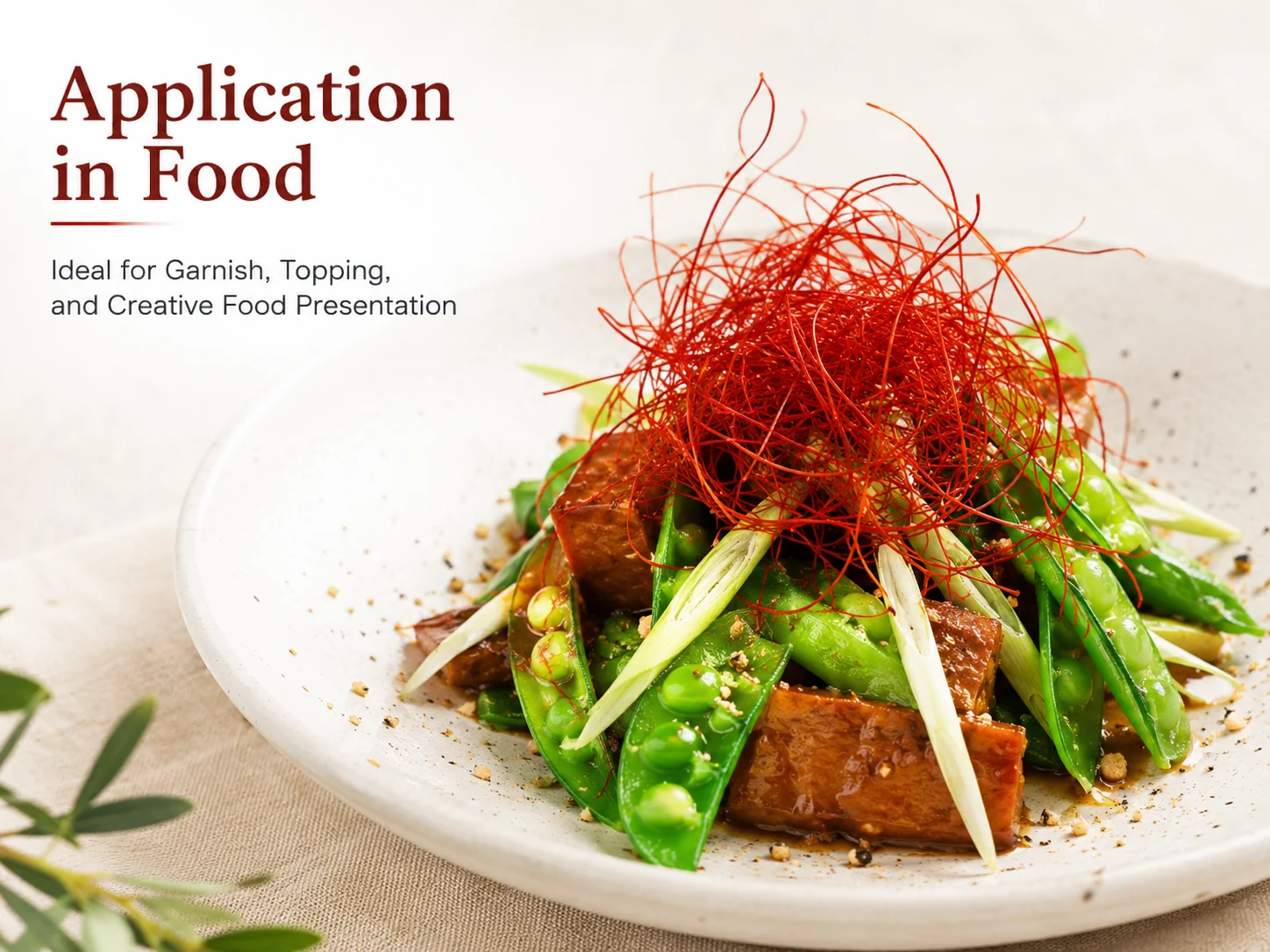Super fine chili threads used as a garnish on a professional plated dish